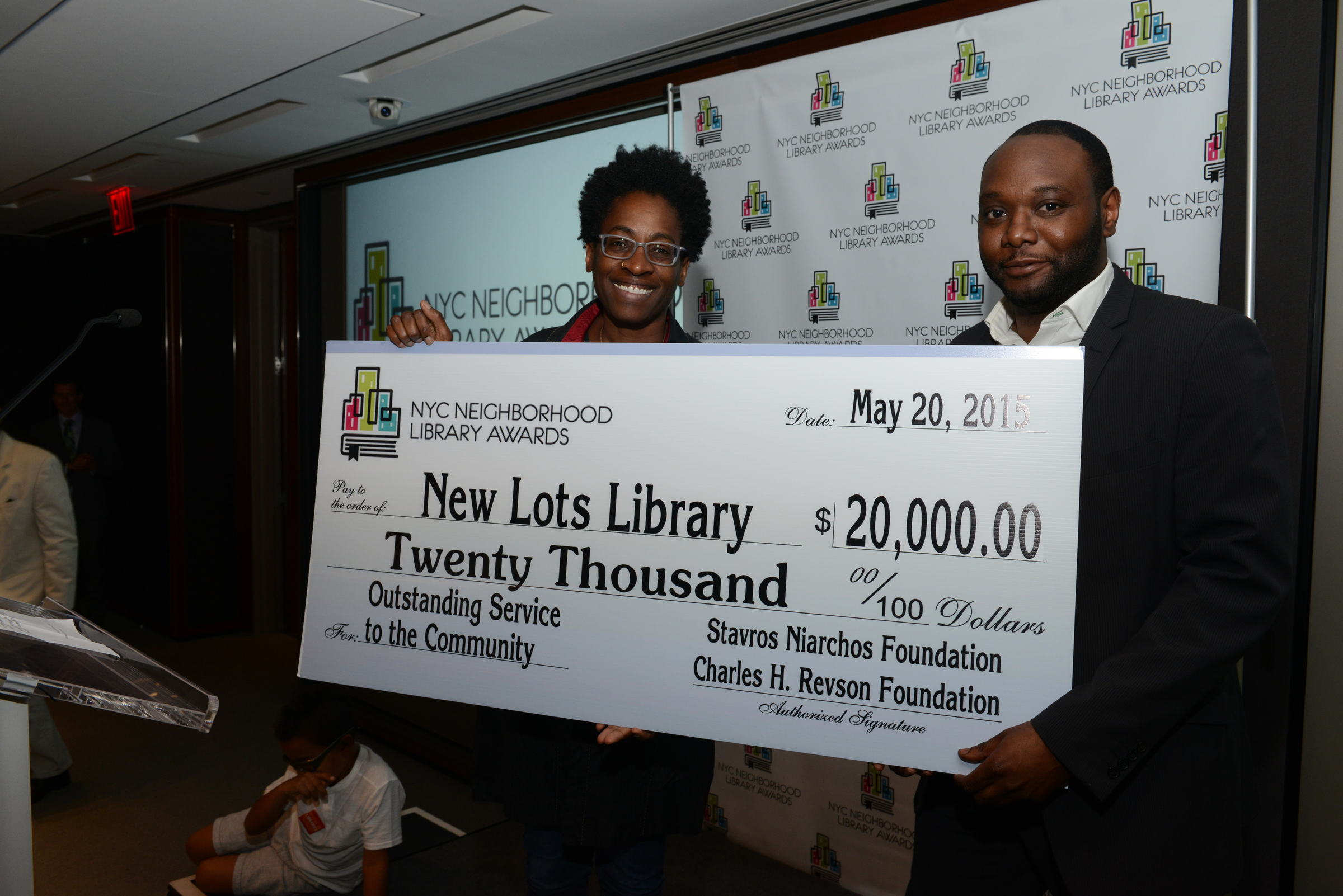 L to R: Library Awards Judge Jacqueline Woodson and New Lots Library Manager Edwin Maxwell
